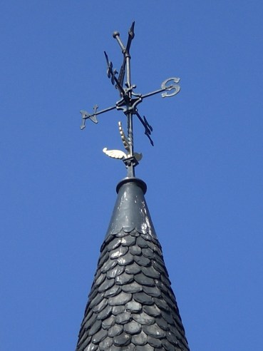 Weather vane, NSEW, blue sky, light